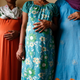 Surrogate mothers pose for a photograph inside a temporary home for surrogates provided by Akanksha IVF centre in Anand town